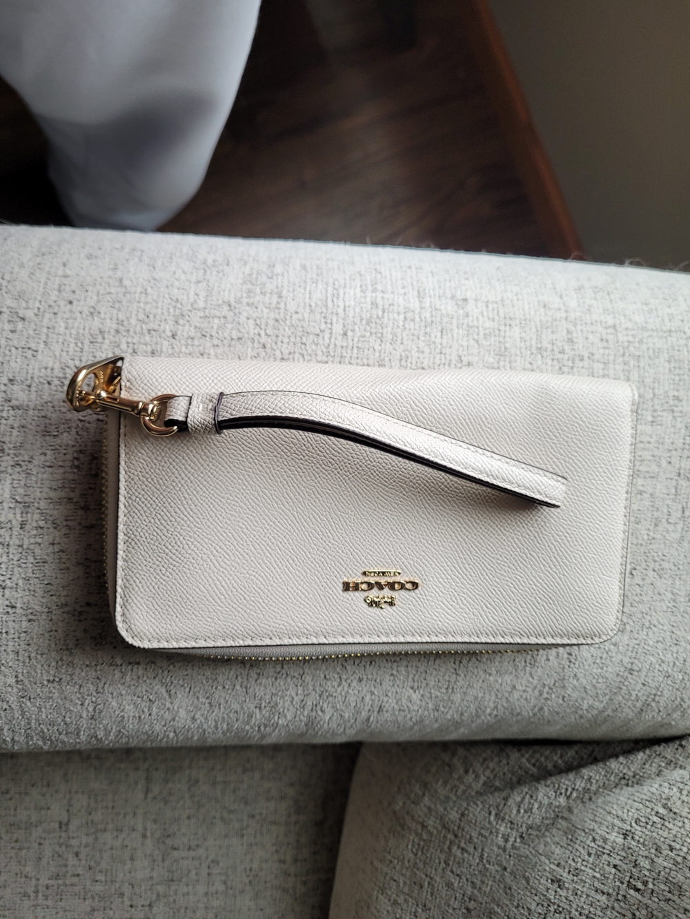 COACH Cream Leather Wristlet with Gold Hardware